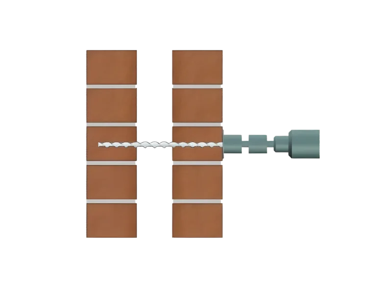 Cross-section showing helical wall tie being drilled through outer brick leaf, across cavity, into inner leaf