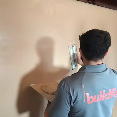 Smooth plaster wall finish after HelicalBar crack repair