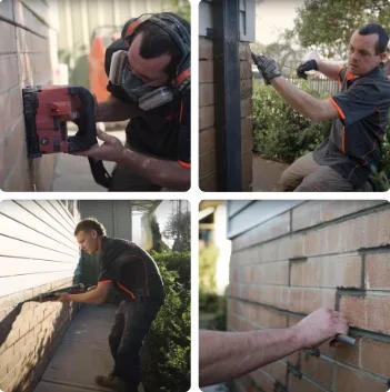 Buildfix technicians installing HelicalBars in brick wall