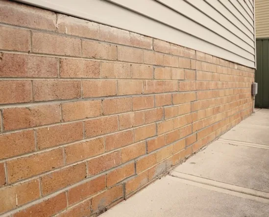 Repaired brick wall with clean finish