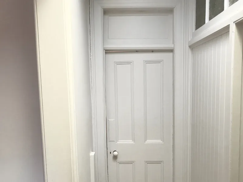 Door sticking in frame due to uneven foundation settlement